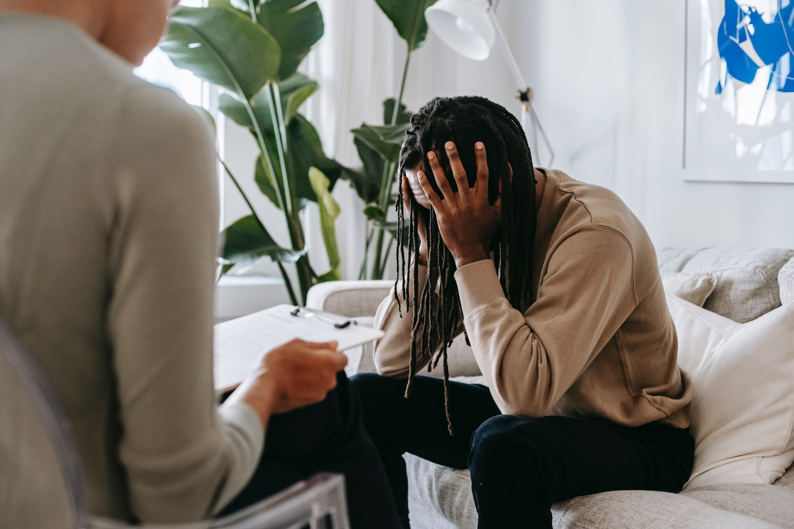 Photo by Alex Green: https://www.pexels.com/photo/stressed-black-man-with-dreadlocks-in-psychological-office-5699455/