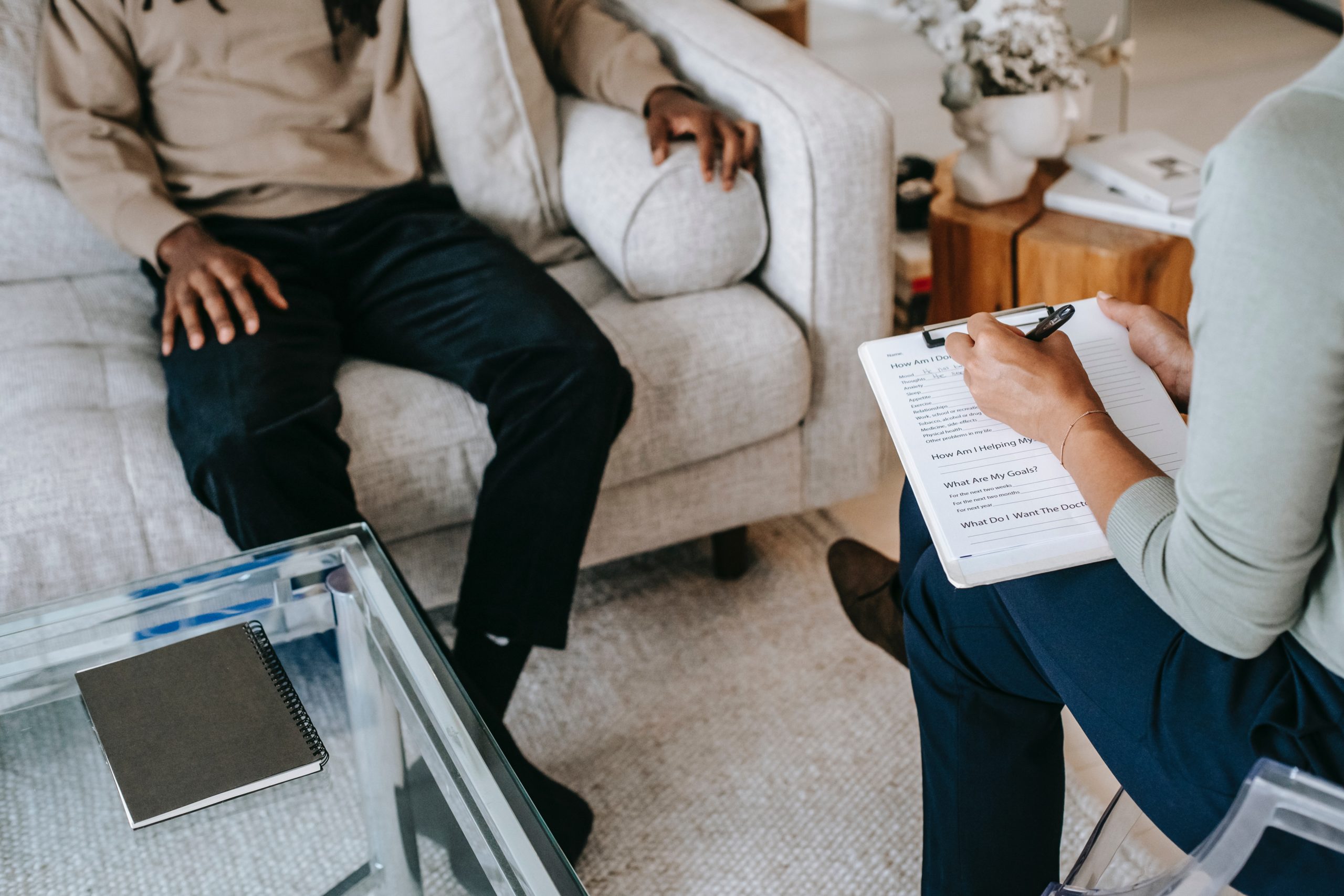 Photo by Alex Green: https://www.pexels.com/photo/crop-unrecognizable-black-man-sharing-complains-with-female-psychologist-5699466/