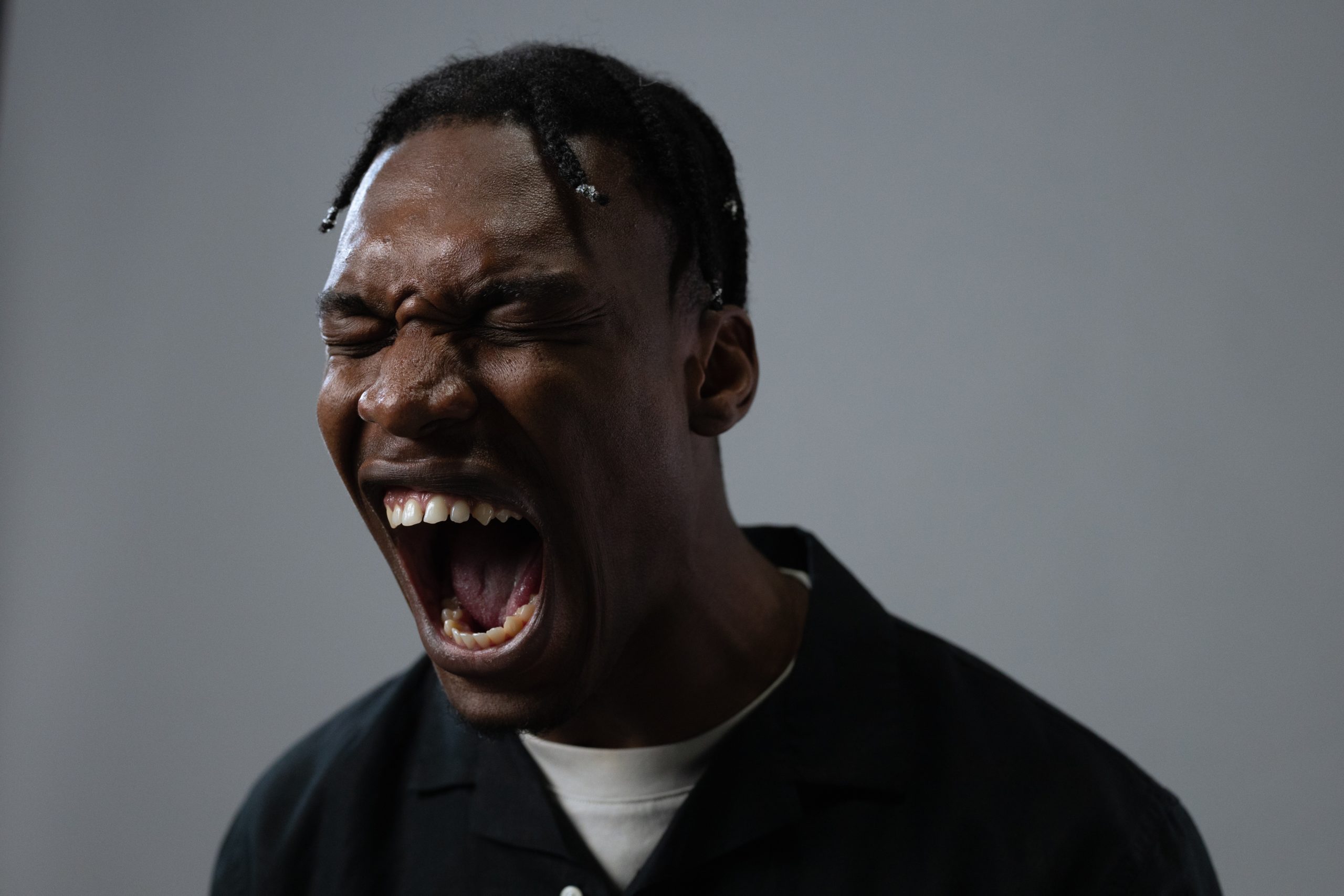 Photo by cottonbro studio: https://www.pexels.com/photo/close-up-photo-of-screaming-man-9063608/