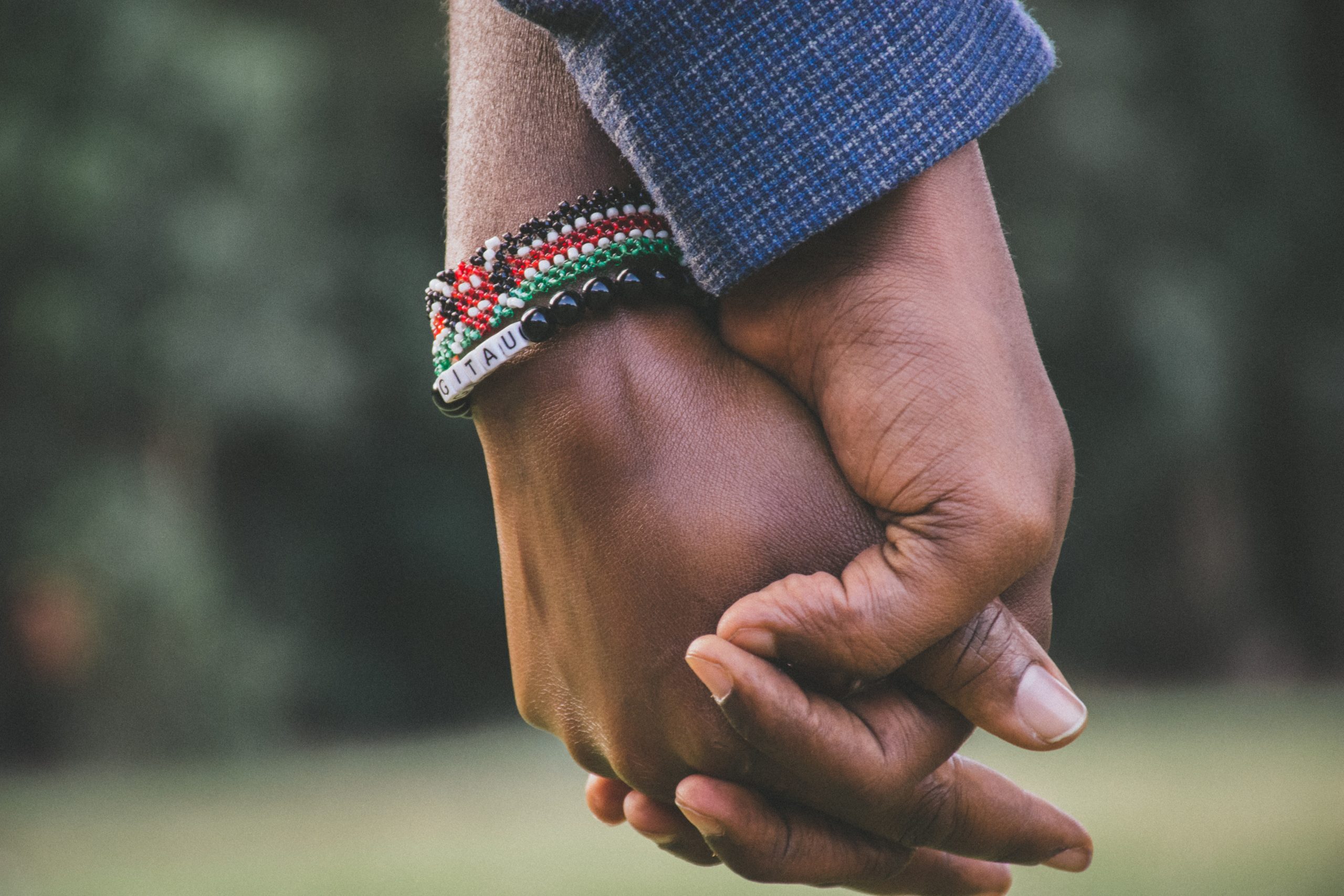 Photo by Git Stephen Gitau: https://www.pexels.com/photo/close-up-photo-of-two-person-s-holding-hands-1667849/