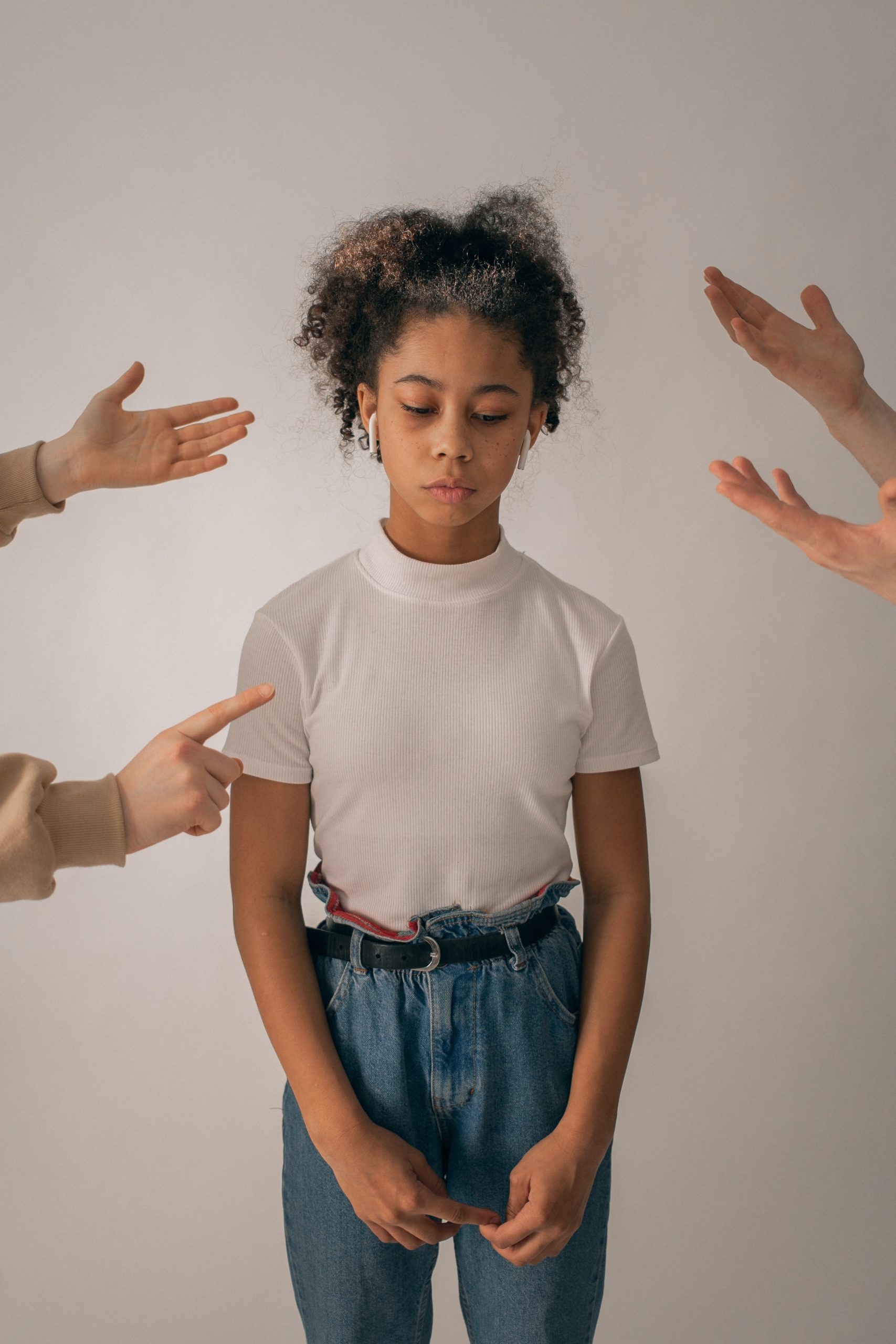 Photo by Monstera: https://www.pexels.com/photo/unrecognizable-people-punishing-sad-black-girl-7114752/