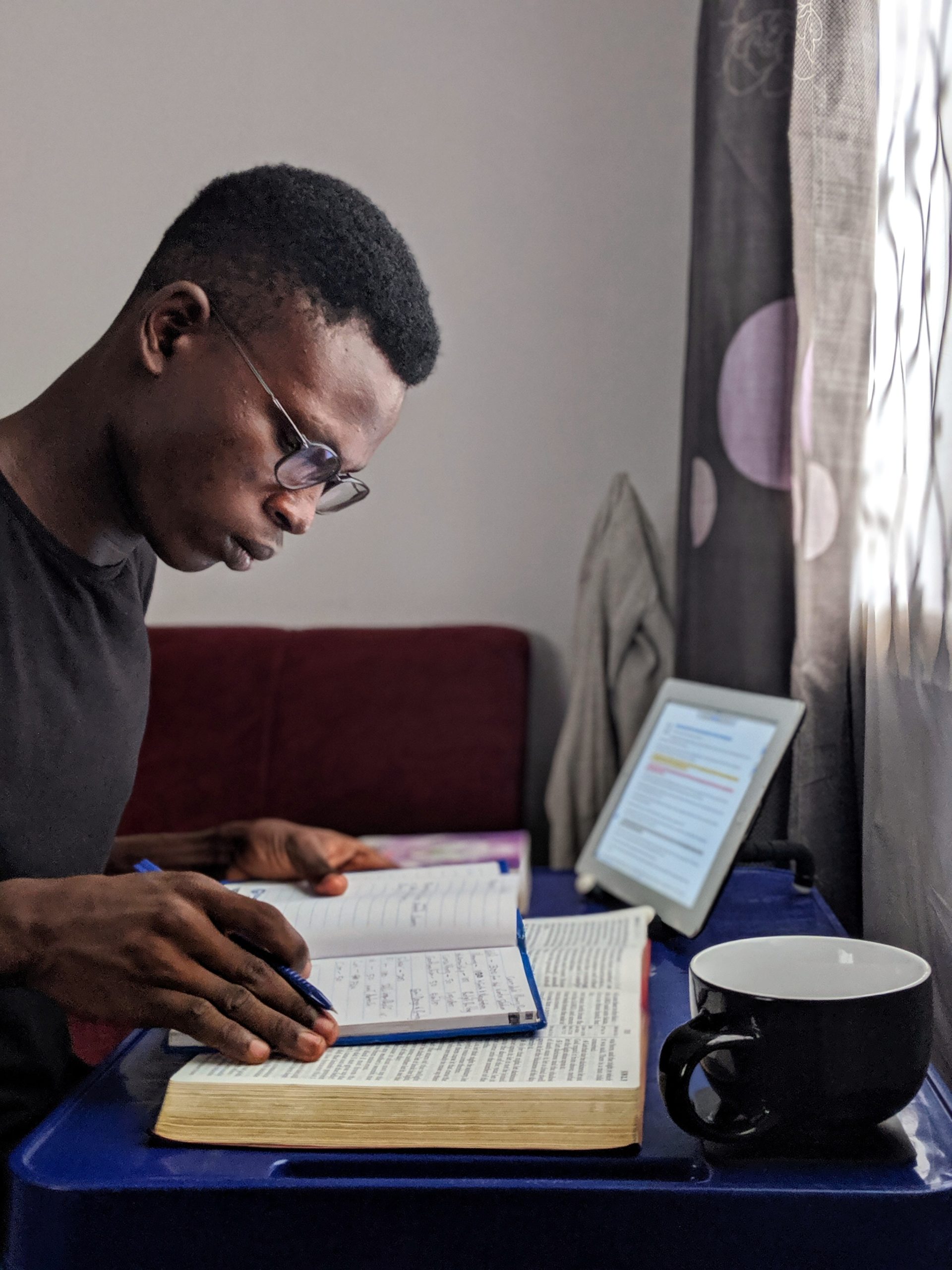 Photo by Oladimeji Ajegbile: https://www.pexels.com/photo/a-man-reading-indoor-2325729/